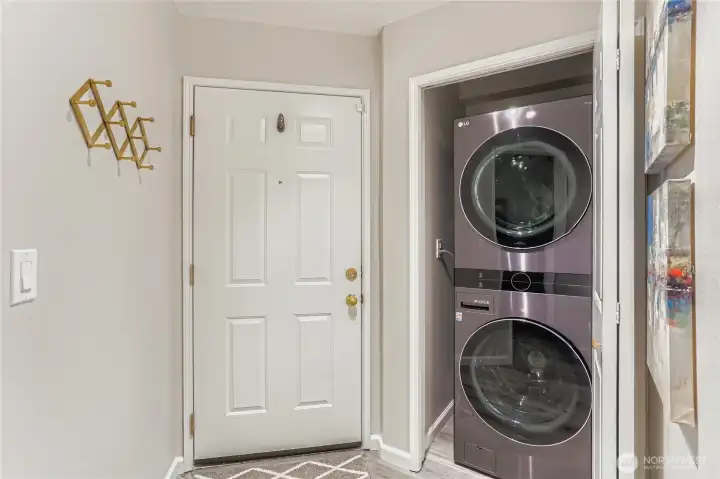 Convenient laundry in the entry to leave all your worries behind