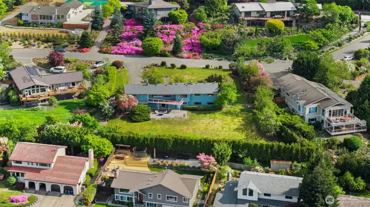 Aerial view of home and .517 acre private lot