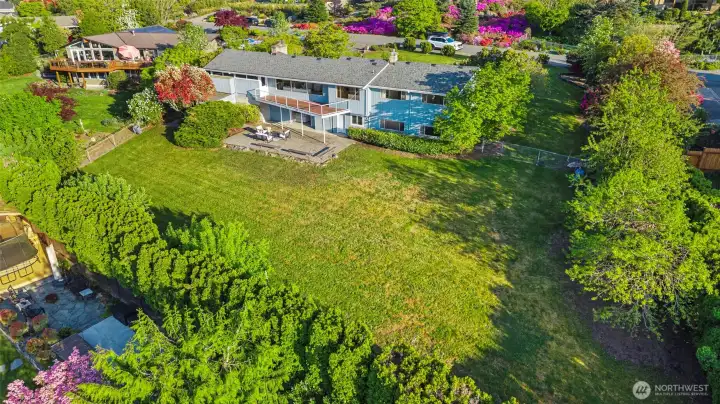 Aerial view of home and .517 acre private lot