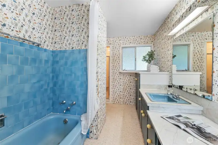 Primary bathroom has separate tub and shower