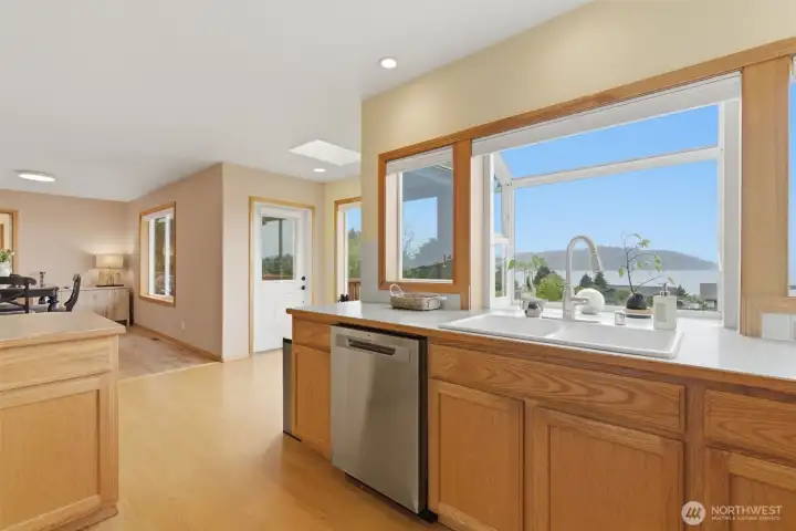 The main level offers an easy, comfortable flow from the kitchen into the dining area—ideal for everyday living and gathering with guests.