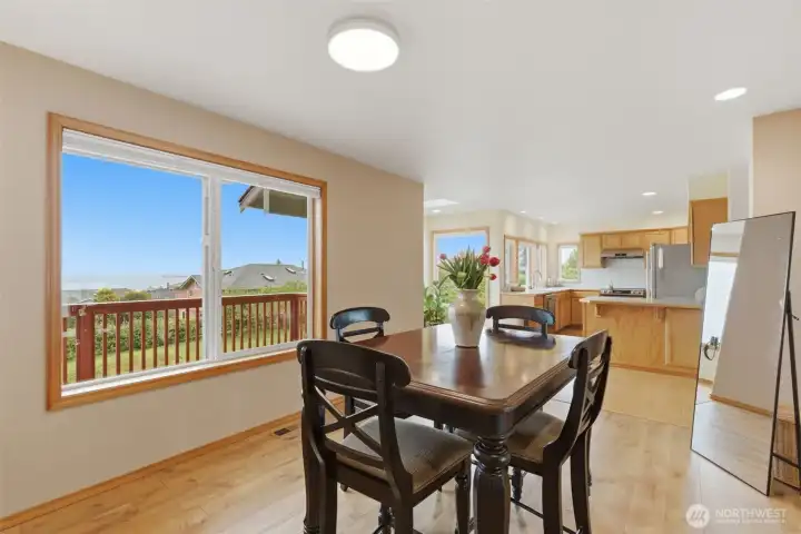 The open flow between the kitchen and dining room allows the cook to stay connected with guests while preparing meals and entertaining.