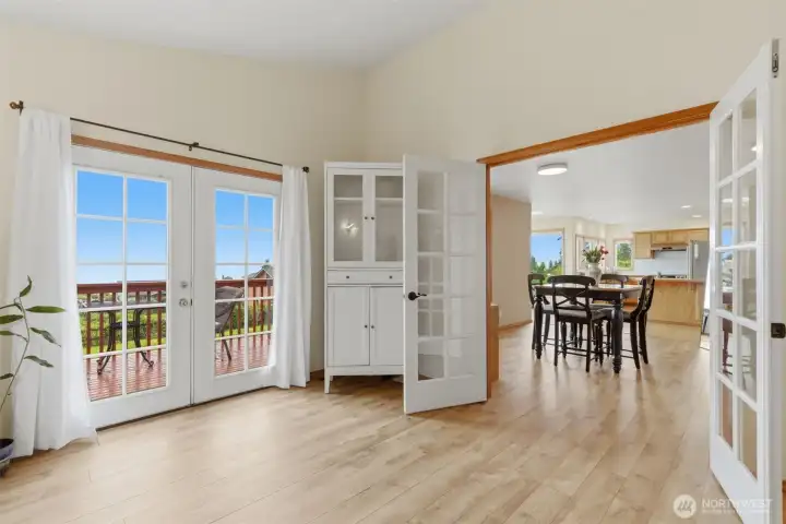 Versatile bonus room with French doors—ideal as a home office, TV room, reading space, or quiet retreat.