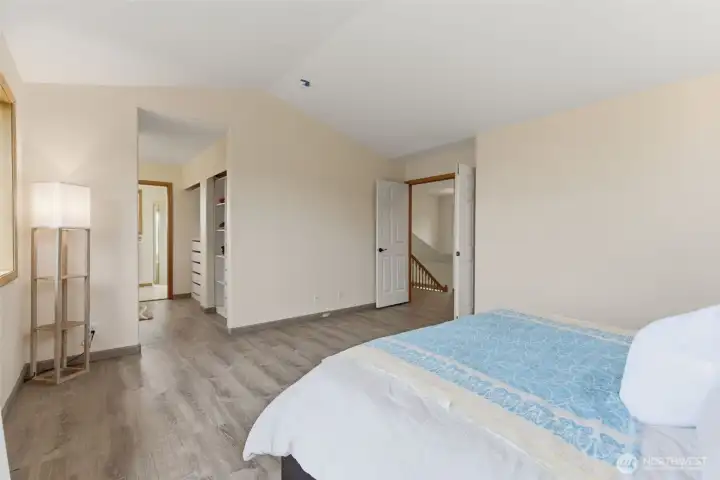 Spacious primary bedroom with calming neutral tones—ready for your personal style and finishing touches.