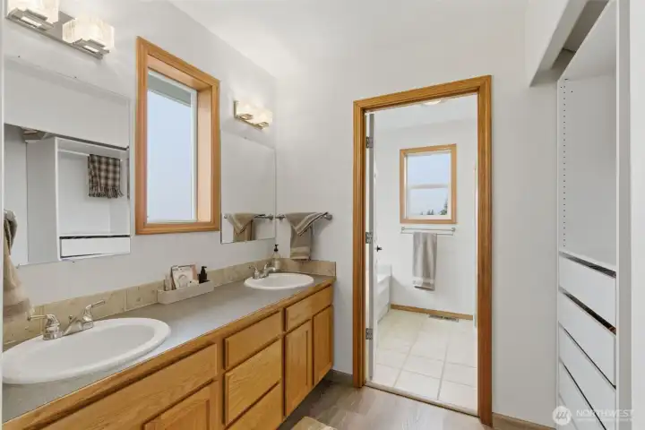 Double sink vanity offers added convenience and plenty of space for busy mornings and everyday living.