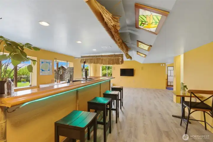 Imagine the gatherings and memorable nights you can host in this fun lower-level entertaining space with easy access to the backyard.