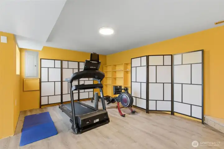 Large nook area offers flexible space for workout equipment, hobbies, or additional storage depending on your lifestyle needs.