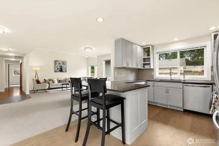 Kitchen counter peninsula serves as a convenient eating space. Kitchen counter peninsula serves as a convenient eating space.