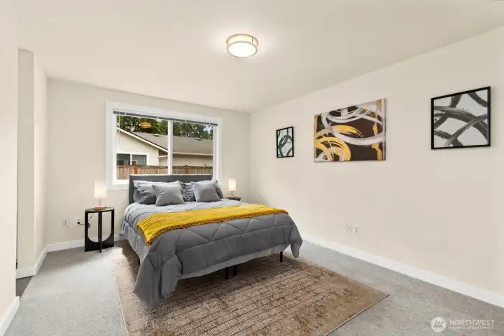 Large primary bedroom at the end of the hall. Large primary bedroom at the end of the hall.