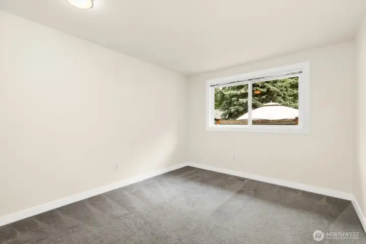 Second bedroom. Clean, bright, and ready for whatever you need the space to be. Second bedroom. Clean, bright, and ready for whatever you need the space to be.