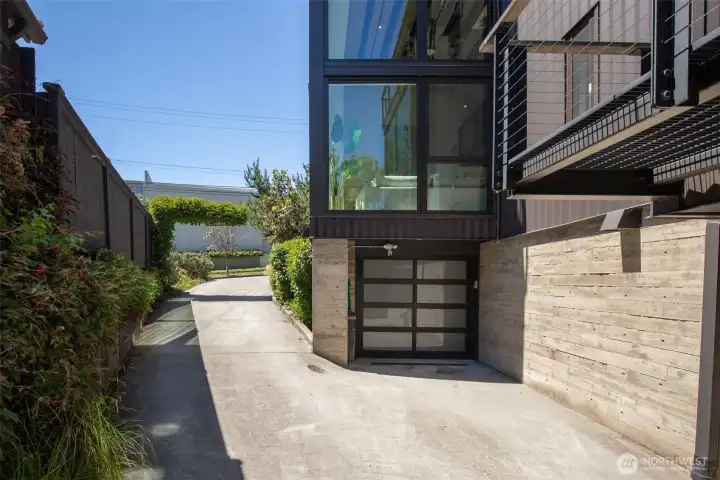 Generous garage with extra storage. Slat-wall storage system and an EV charger, ready to go. Generous garage with extra storage. Slat-wall storage system and an EV charger, ready to go.