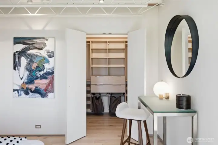 Custom California Closets throughout — birch wood detailing in the primary suite. Custom California Closets throughout — birch wood detailing in the primary suite.