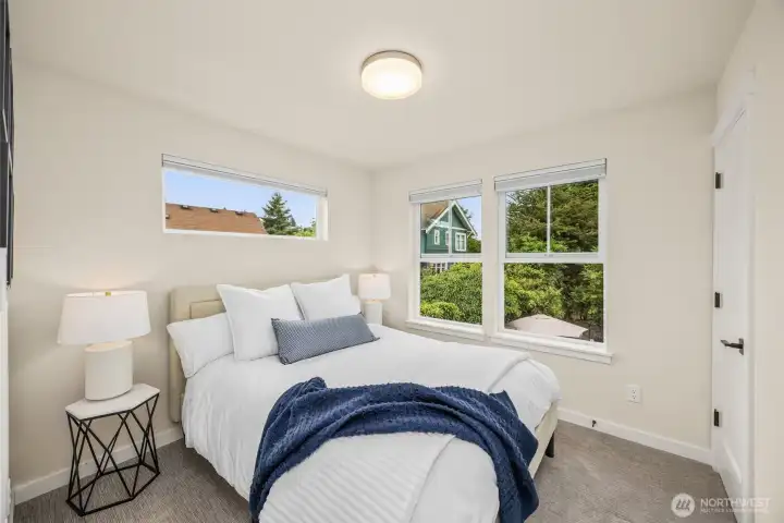 The third bedroom on the upper floor with a closet. The third bedroom on the upper floor with a closet.