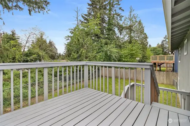 From the dining room, walk out to the large deck.