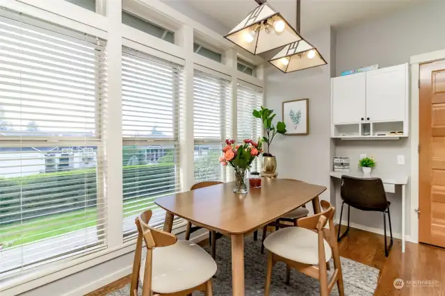 Nook area with built in desk and walk in pantry