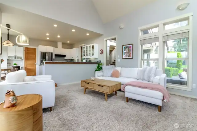 Open concept living off kitchen.