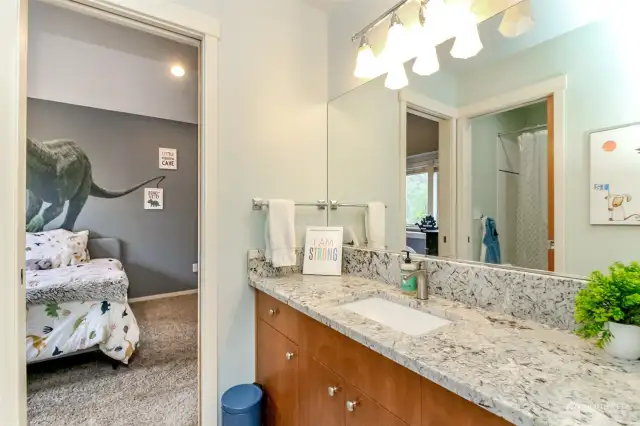 Jack and Jill bath with granite countertops.