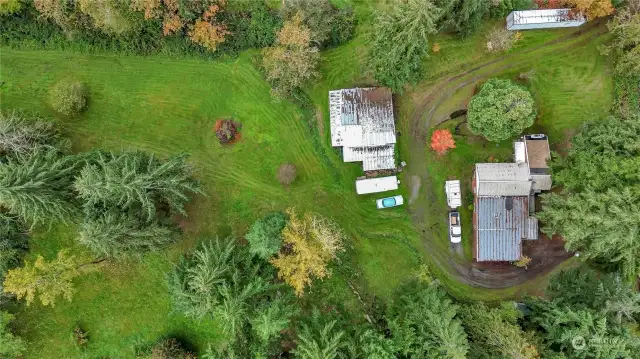 Semi trailer leaves with the seller.   Aerial shows size of barn better. Well maintained property.