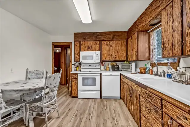 Another View of the Kitchen, Shows off the beautiful cabinets, plenty of counterspace - Bright & Cheery
