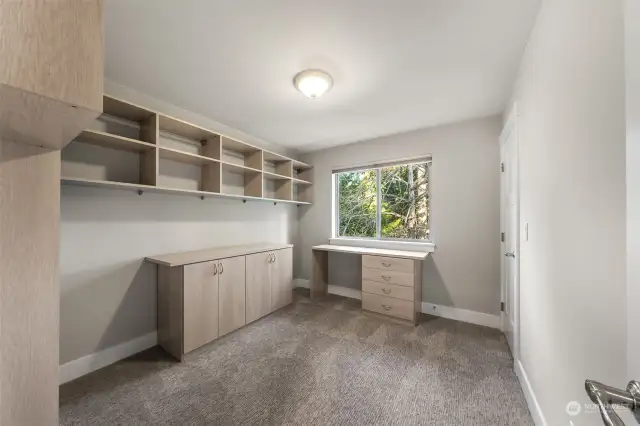 4th upstairs bedroom currently used as home office space includes walk in closet with organizers.