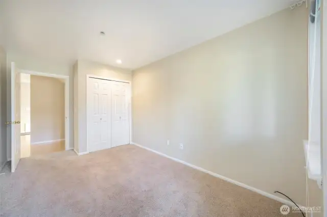 Bedroom #2 looking towards entryway