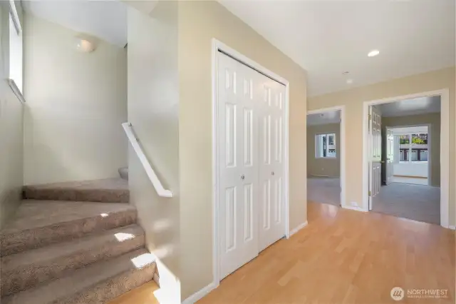Entry features 3/4 bath unpictured to the right, 2 bedrooms with separate access to bonus/sun room, utility closet and large secondary entry closet