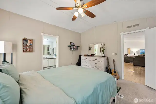 Primary Suite Easily Accommodates a King Size Bed! Ceiling Fan, & Newer Carpet!