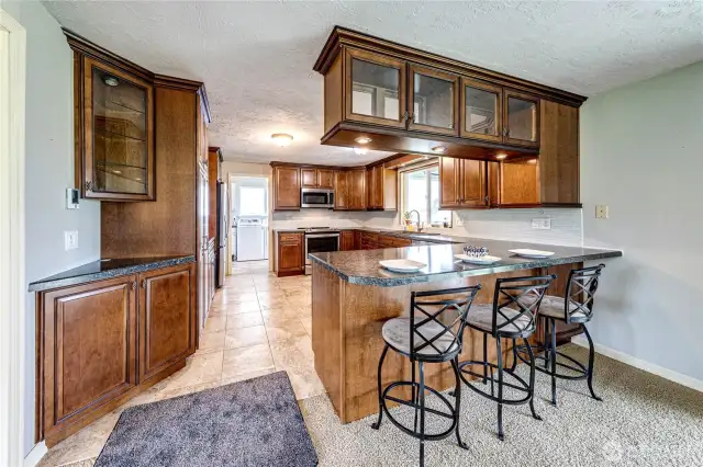 Rich cabinetry with lots of cupboard space!