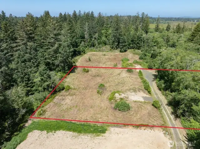 6.6 Acre Parcel with almost 20,000 square feet building site, electricity, cable, and road to the property. Come build your dream home