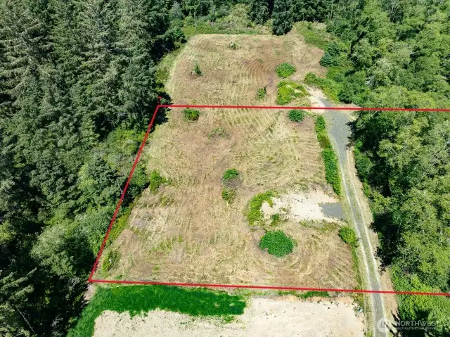 6.6 Acre Parcel with almost 20,000 square feet building site, electricity, cable, and road to the property. Come build your dream home