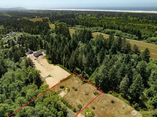 6.6 Acre Parcel with almost 20,000 square feet building site, electricity, cable, and road to the property. Come build your dream home