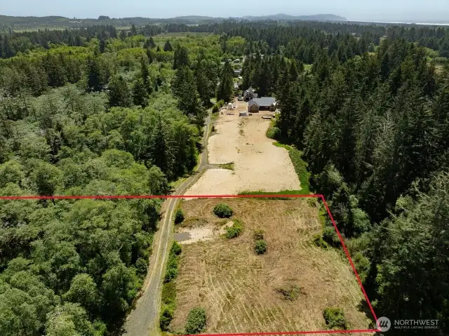 6.6 Acre Parcel with almost 20,000 square feet building site, electricity, cable, and road to the property. Come build your dream home