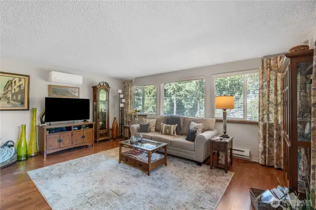 Upon entering, you are greeted by a large inviting livingroom
