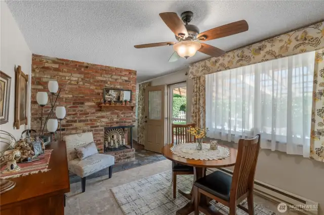 Dining room with door that leads out to a huge covered patio