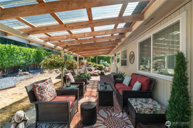 Large covered patio with brick pavers to enjoy any time of the year