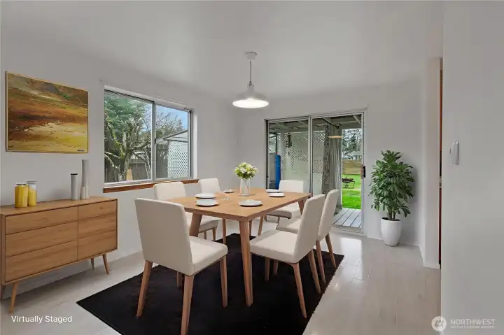 Dining area off kitchen, leads to patio outback. Great for BBQs.