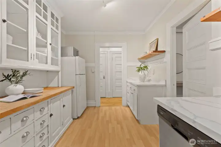 Spacious kitchen with butler doors to the dining room