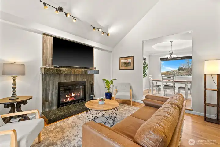 Wood burning fire place, vaulted ceilings, harwood flooring