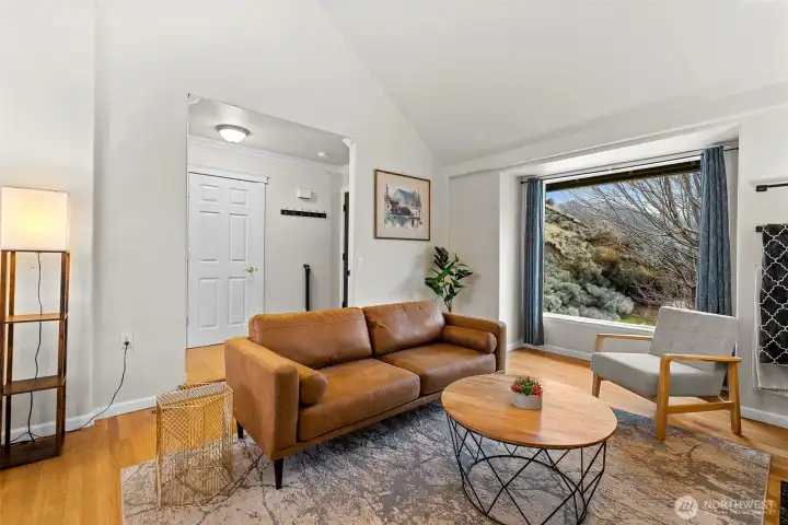 Well lit & inviting entry & living area