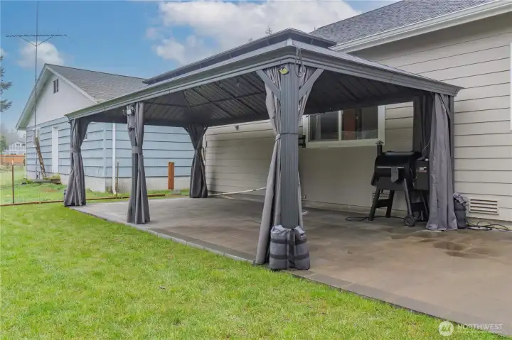 Gazebo is attached to stone for support