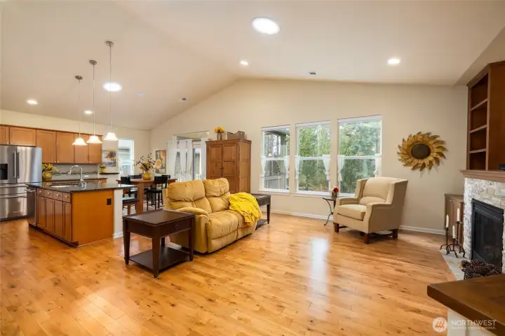 Living area open to kitchen and dining
