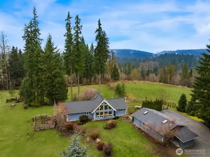 Five usable, parklike acres with panoramic view. Sunny and open with just enough trees to add privacy and scenic beauty!