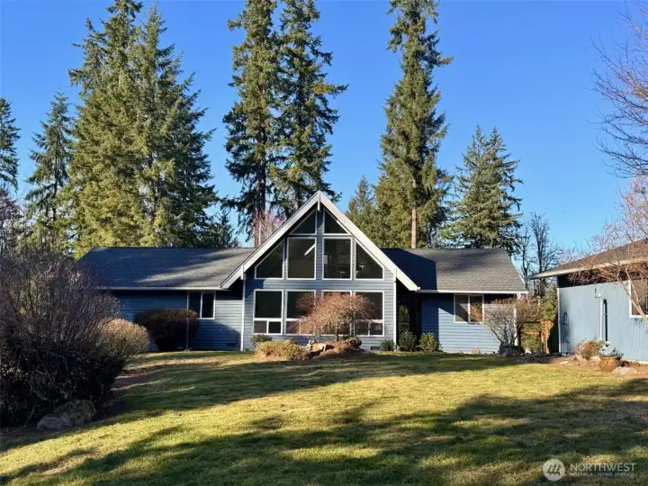 Remodeled farmhouse style rambler with panoramic valley and Cascade foothill views from numerous vantage points.