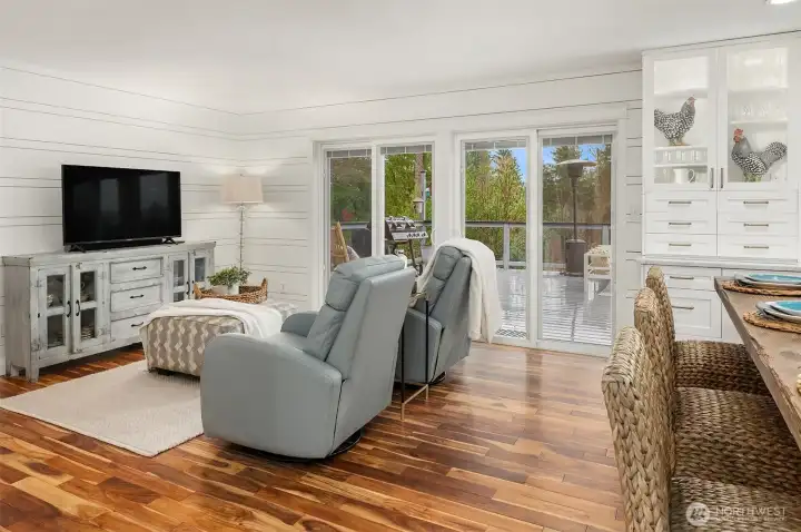 Family room / sitting area with access to the expansive deck for easy indoor/outdoor living.