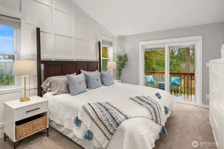 Primary suite large walk-in closet/laundry center, remodeled bath and private deck.