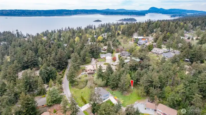 Partial view lot with water and electric at street.