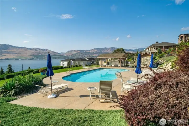 Resort-style community pool overlooking stunning panoramic views of Lake Chelan and the surrounding mountains. A perfect place to relax, unwind, and enjoy sunny days just moments from your doorstep in Crystal View Estates.