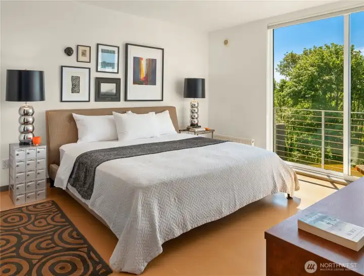 The primary bedroom has ample space for this king-sized bed.