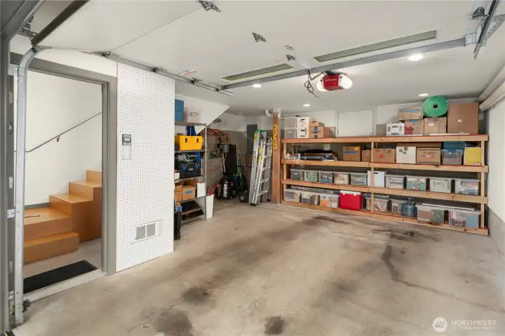 The 380sf garage is over-sized. Easily fit your car plus extra storage, motorcycles, or project space.