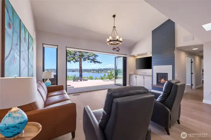Living room opens fully opens up to the deck with the custom door! Living room opens fully opens up to the deck with the custom door!
